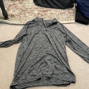 Under armor quarter zip, light material, loose fit